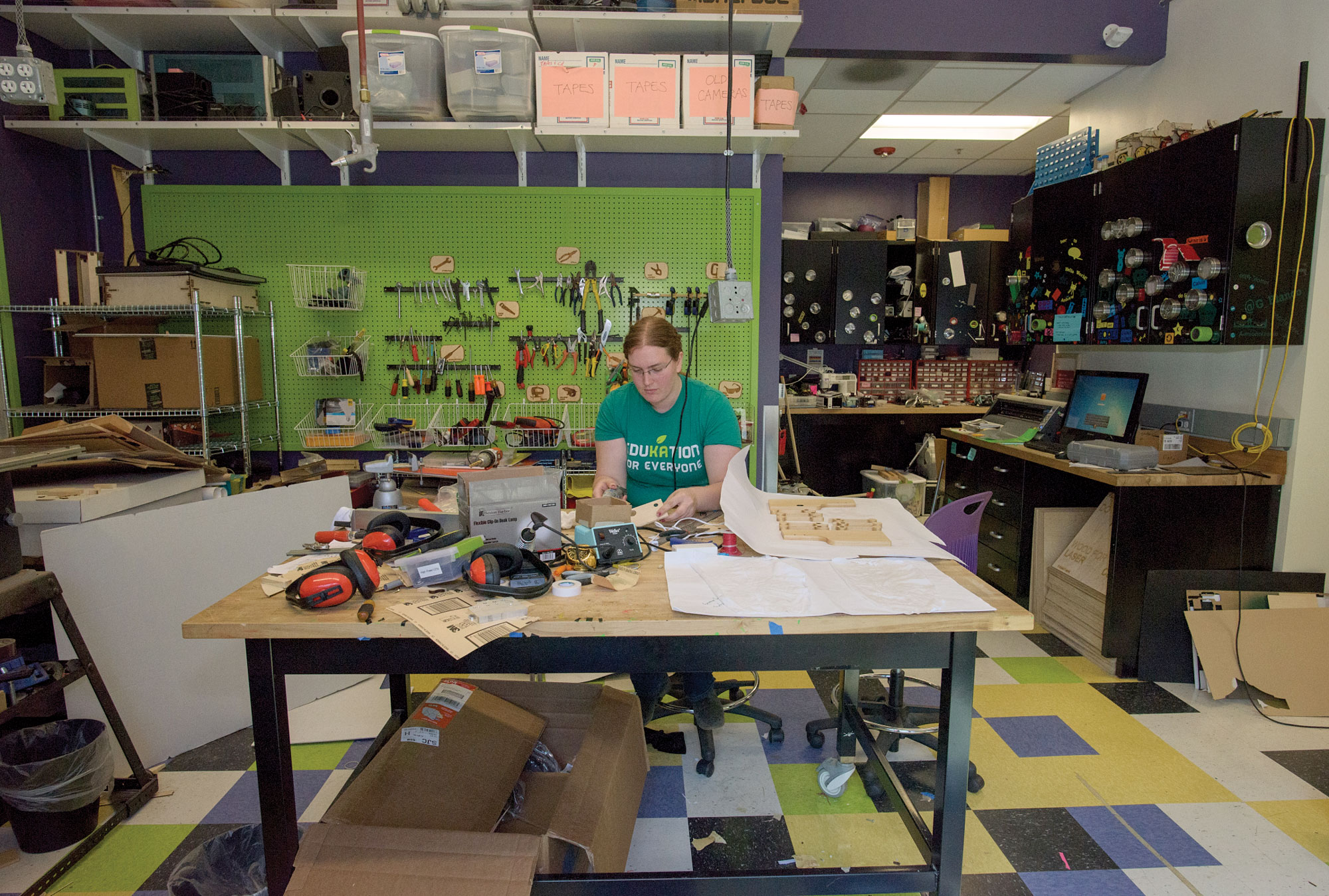 A woman creating in Fab Lab