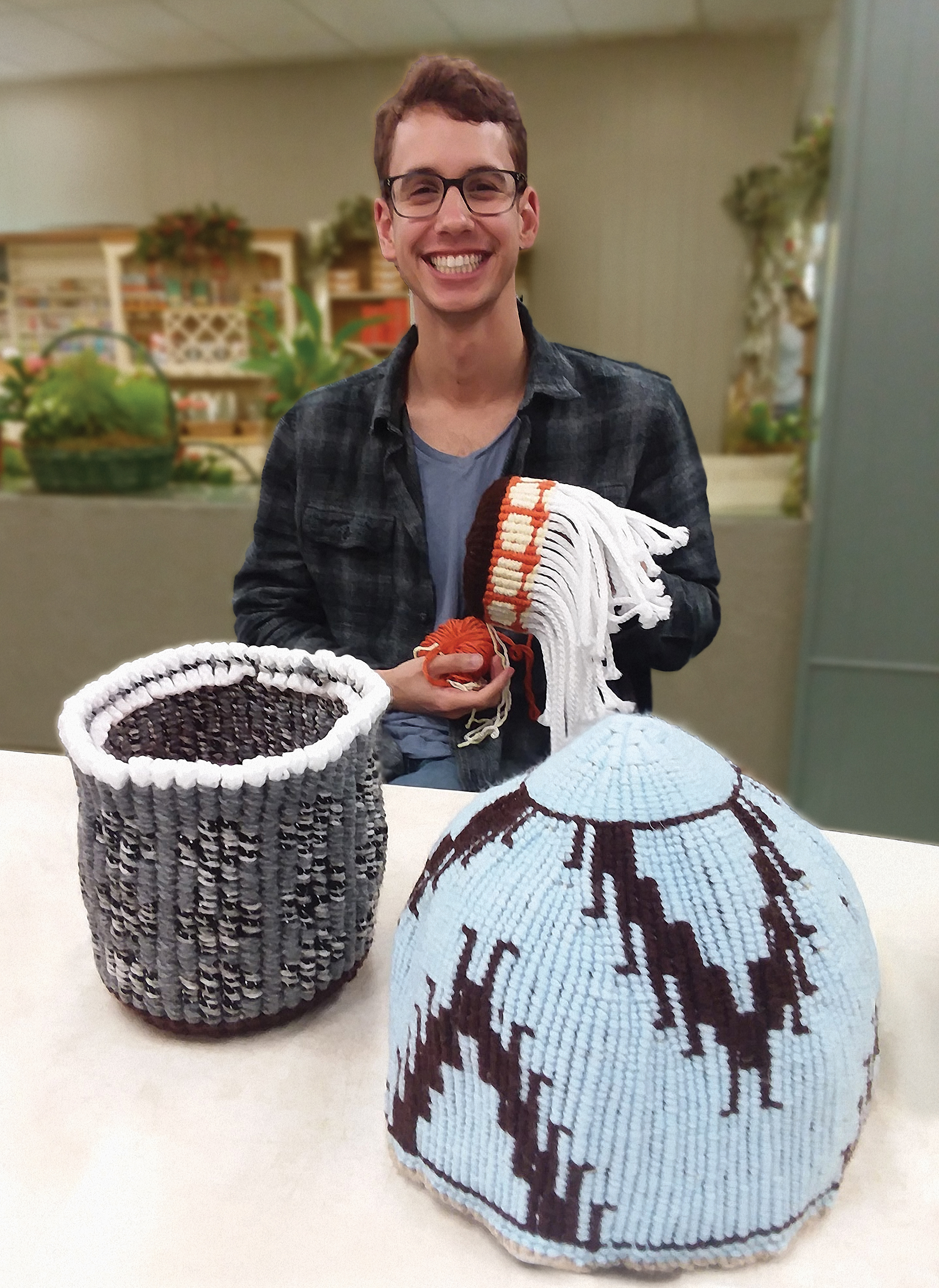 Keegan Livermore with Native American weavings