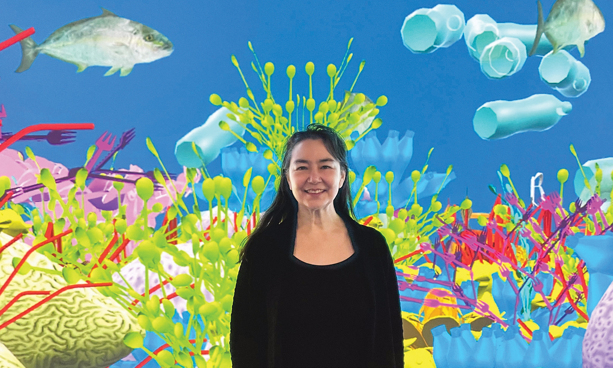 Portrait of Tamilo Thiel in front of one of her installations