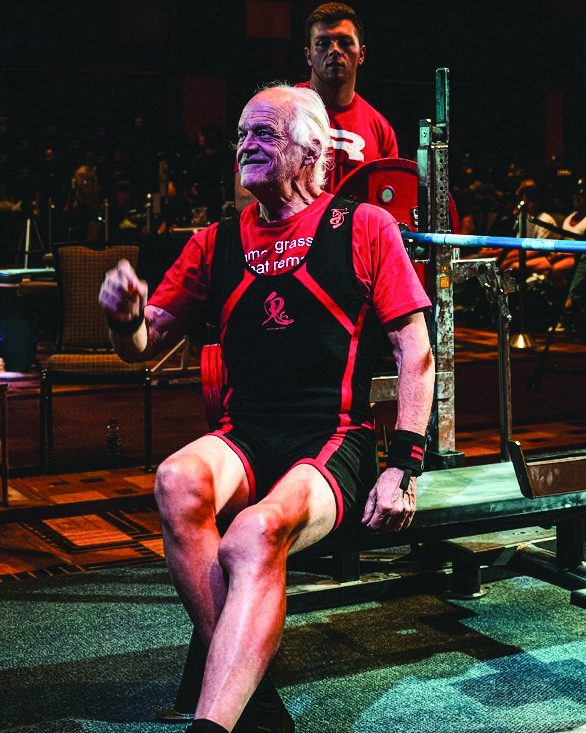 John Twineham sitting on a weightlifting bench