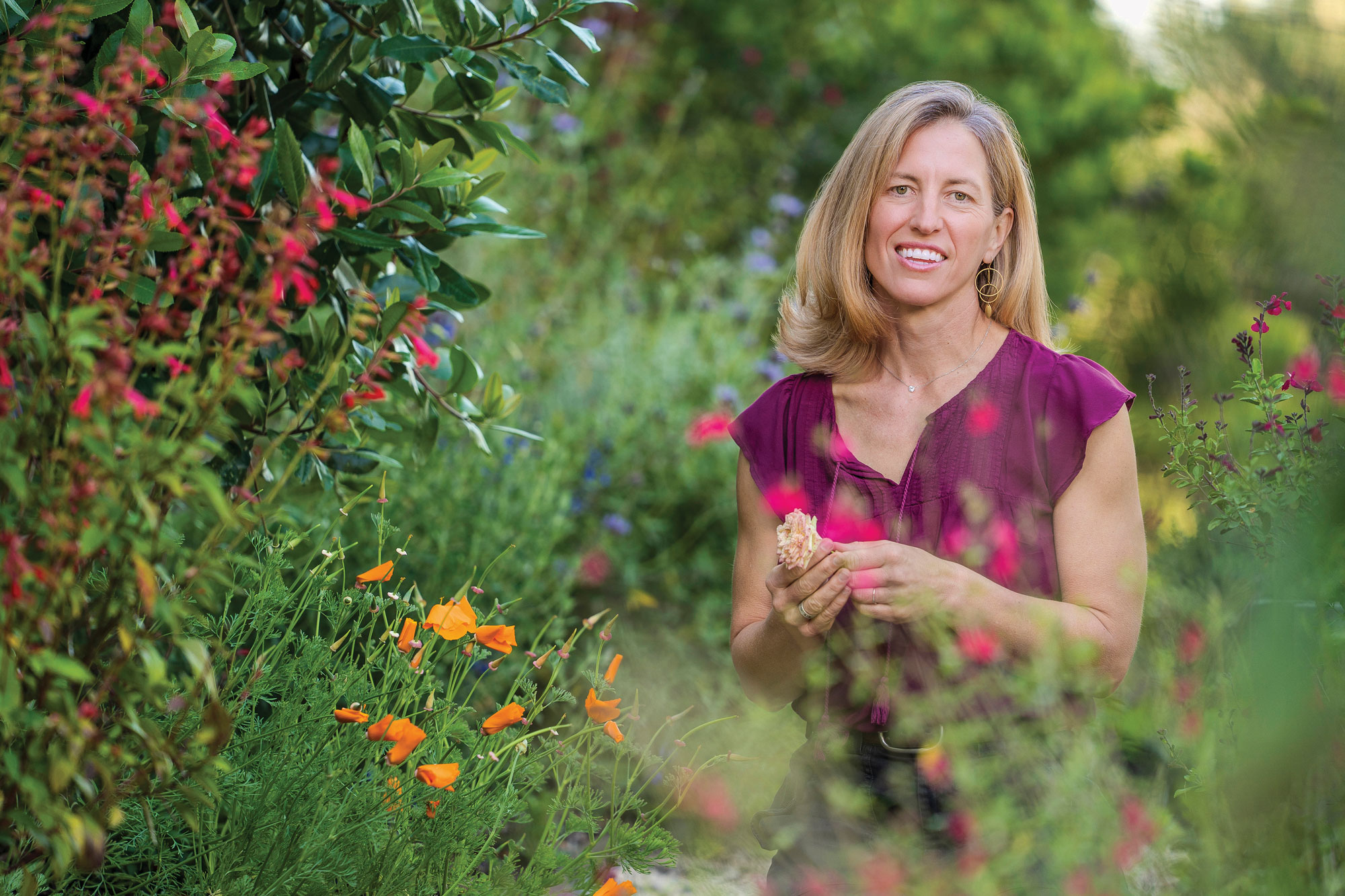 Photo of Elizabeth Sattely in her garden