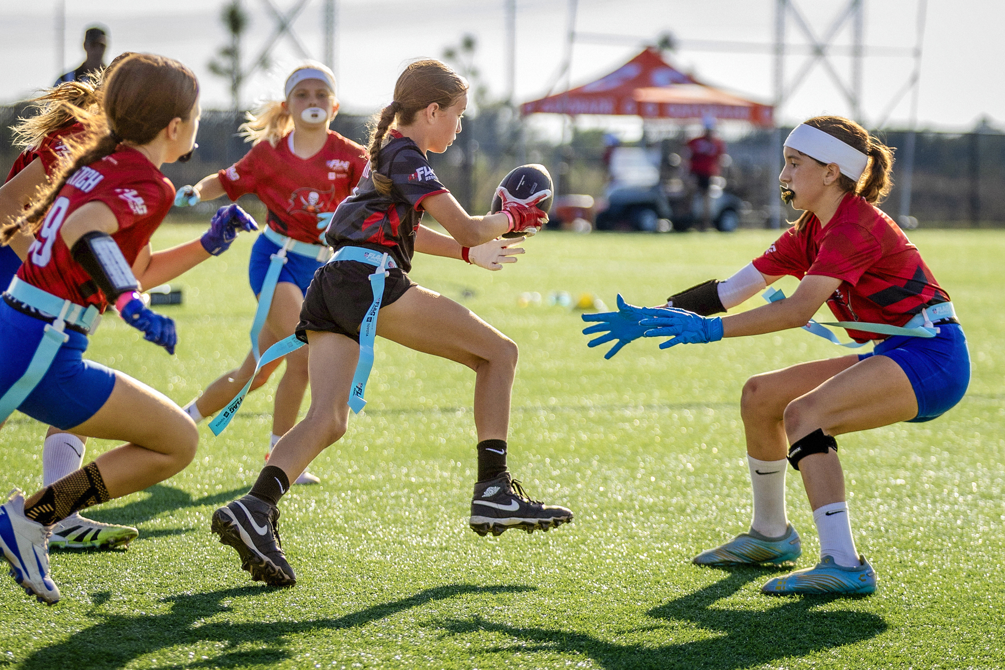 Girls playing flag football