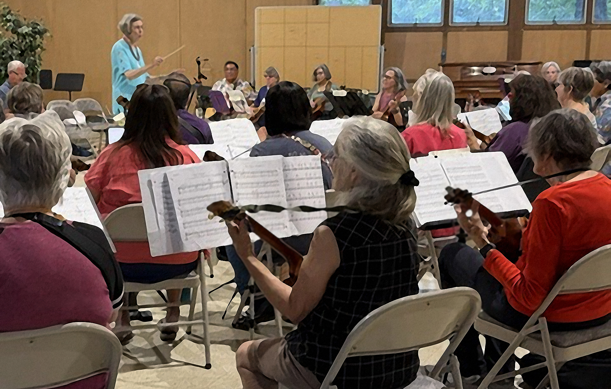 Nancy Piver conducting the ukestra