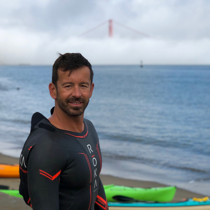 Alex Kostich wearing a wetsuit.