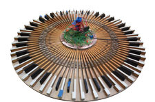 One of Berlier's pieces. It is a large circle with metal rods on the exterior and colorful flowers in the middle.