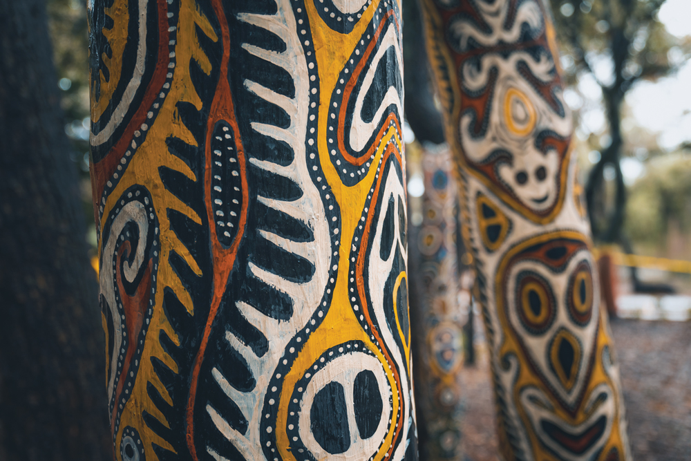 Close-up of painted poles.