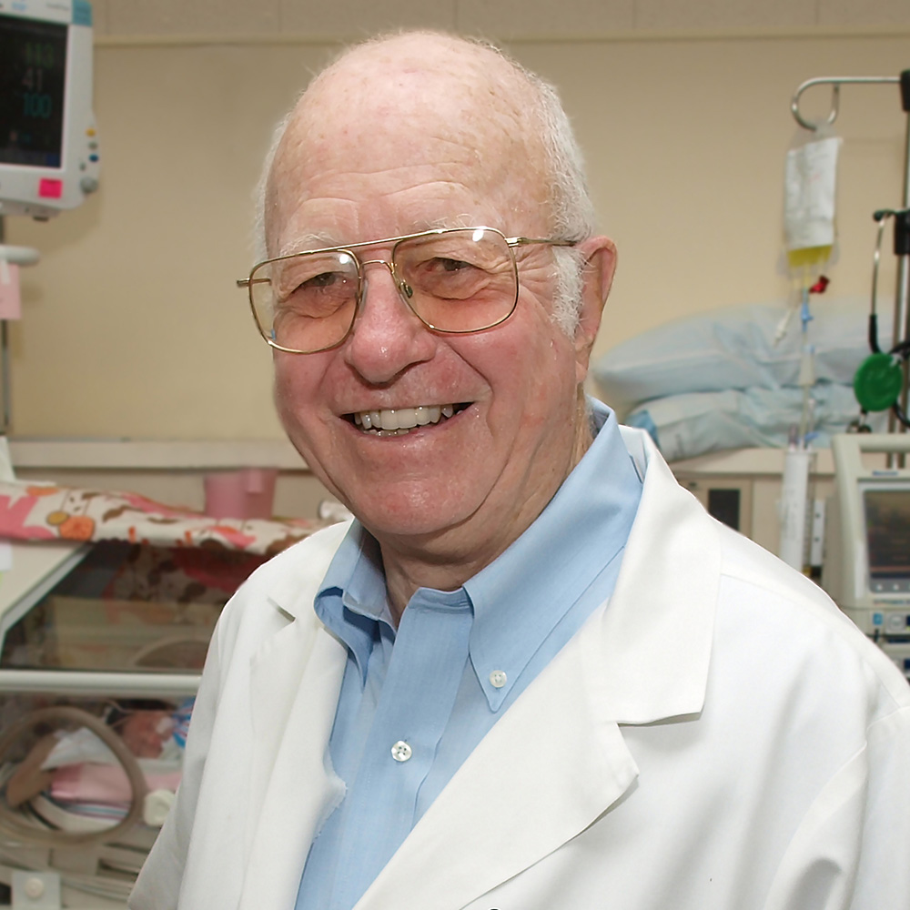 Photo of Philip Sunshine in white doctor's coat