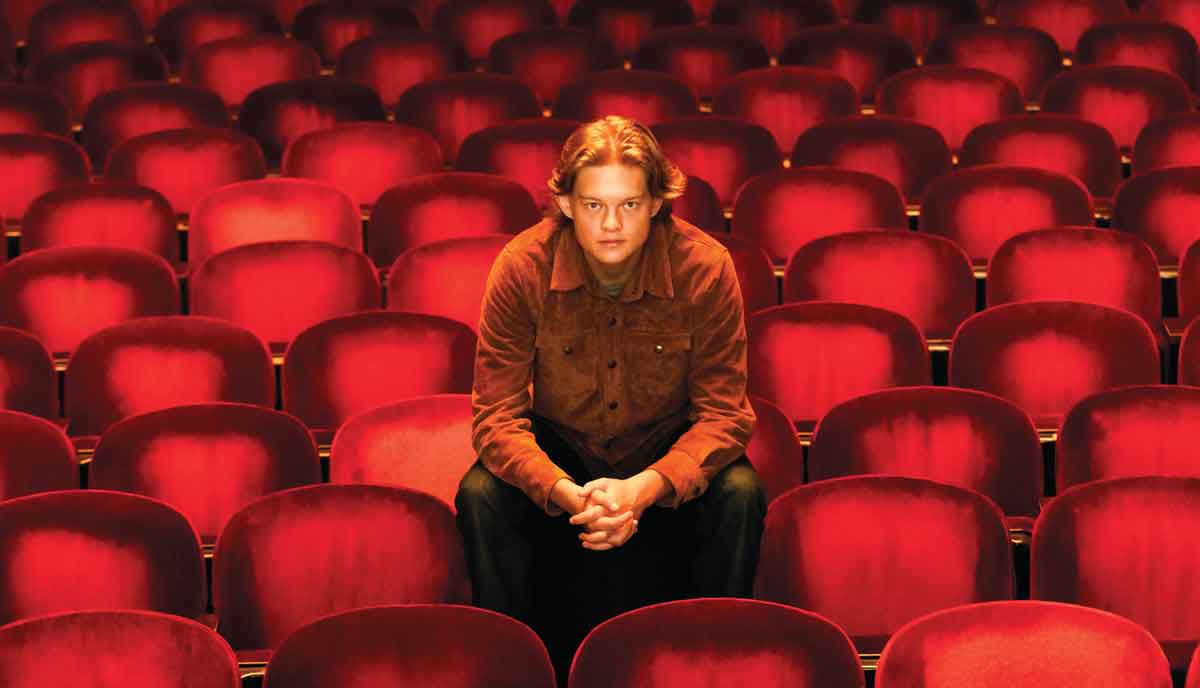 West Mullholland sitting in audience chairs