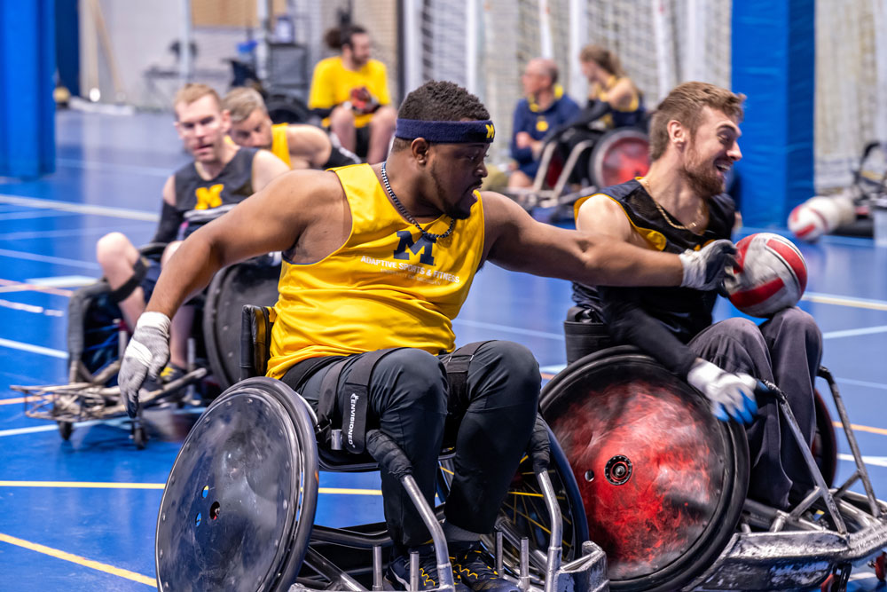 Dr. O and others playing wheelchair rugby.