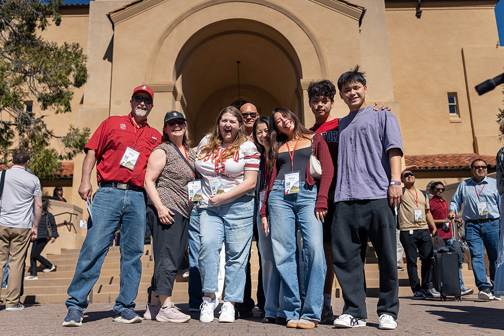 Loved ones standing in a group in front of Memorial Auditorium.