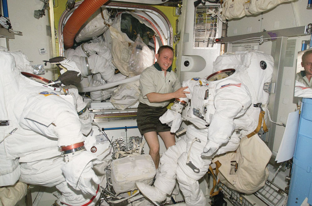Mike Finke working on space suits