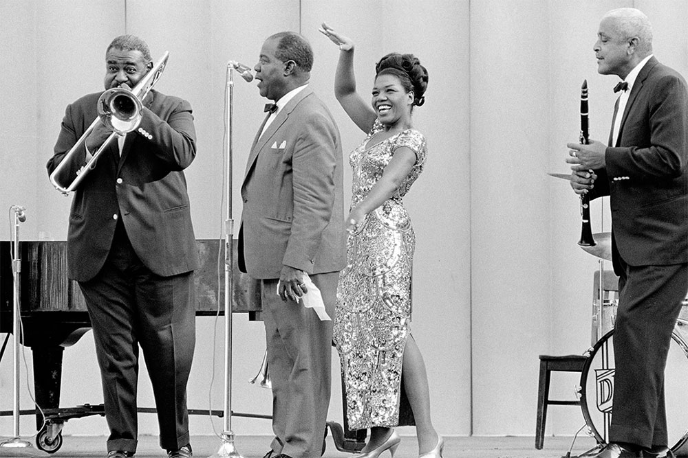 Louis Armstrong and others on stage
