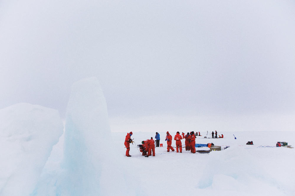 Scientists on an ice field